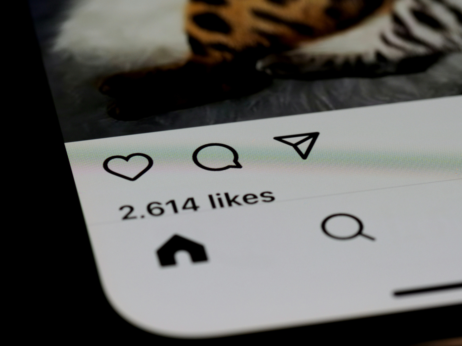 Close-up of social media likes on a phone