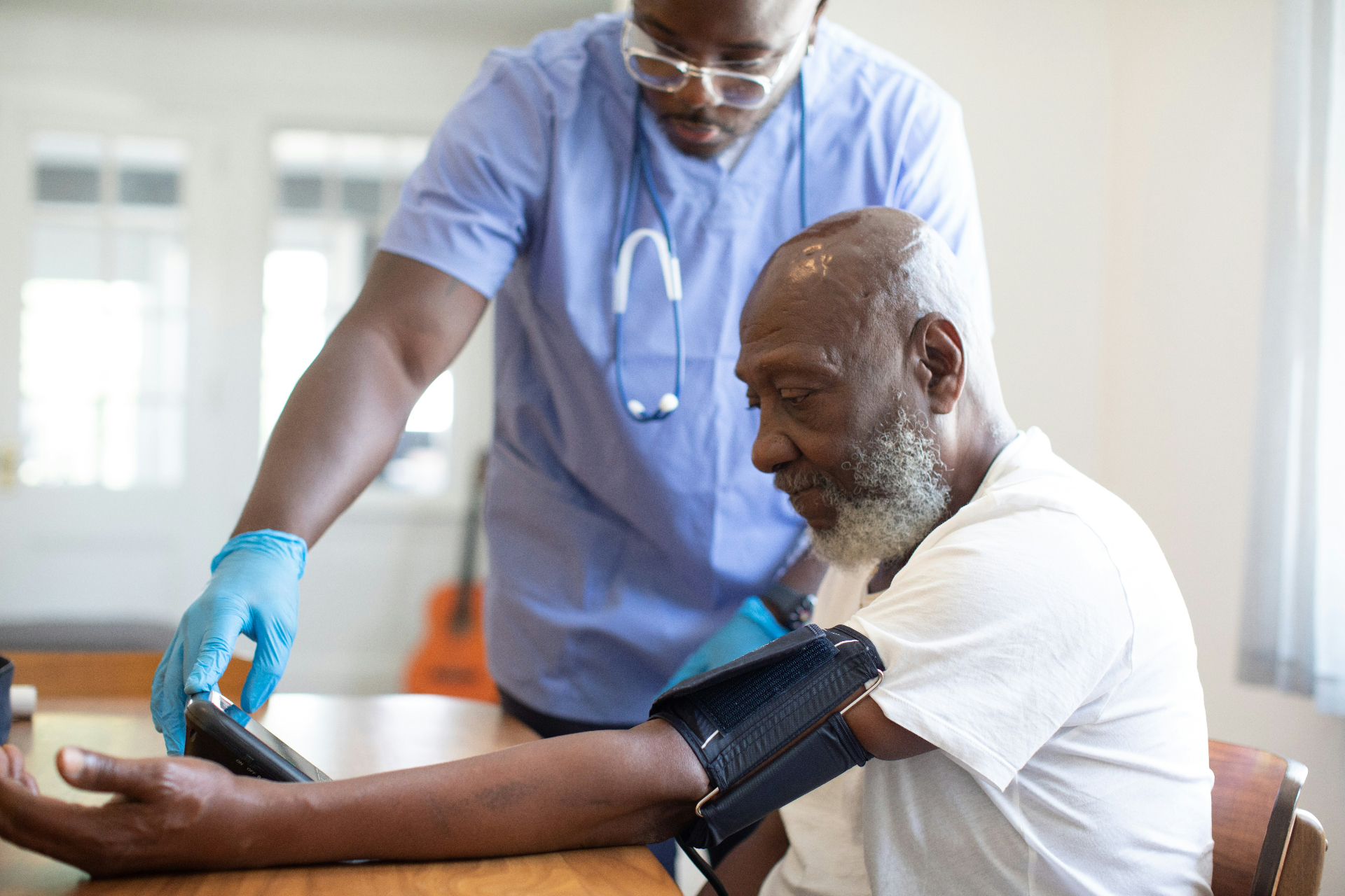 Healthcare provider caring for a patient during a checkup