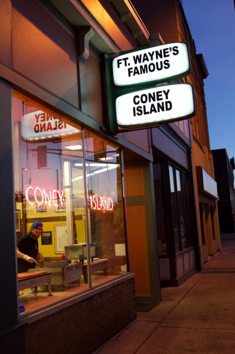 Fort Wayne's Famous Coney Island storefront at dusk