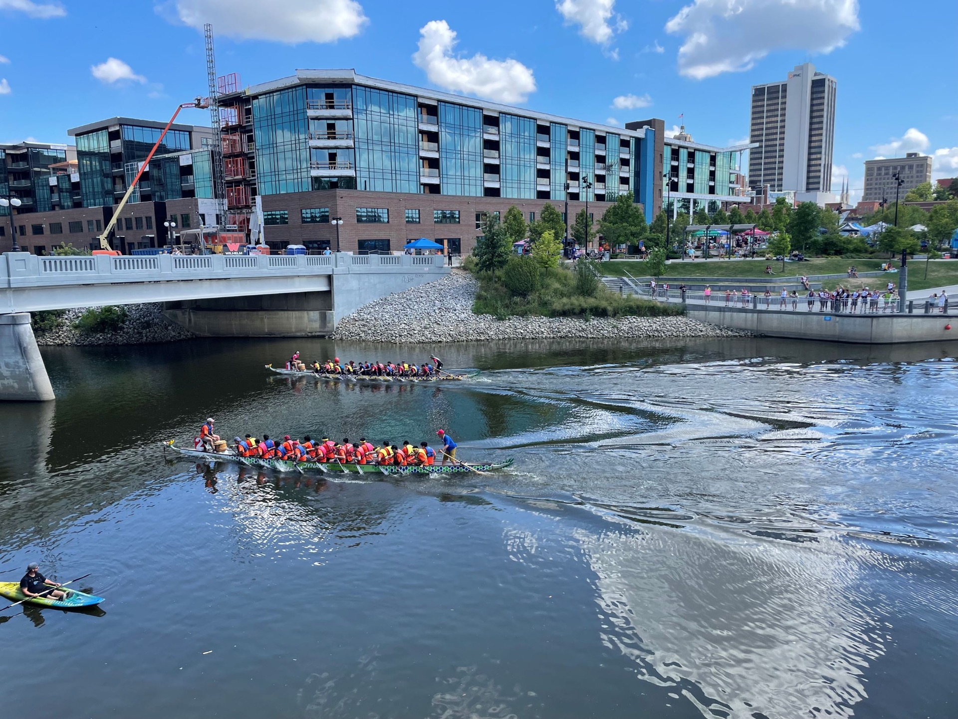 Dragon boat teams racing on the St. Marys River along the Fort Wayne riverfront
